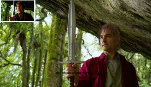 Rob Emery as Bilbo Baggins holding Sting